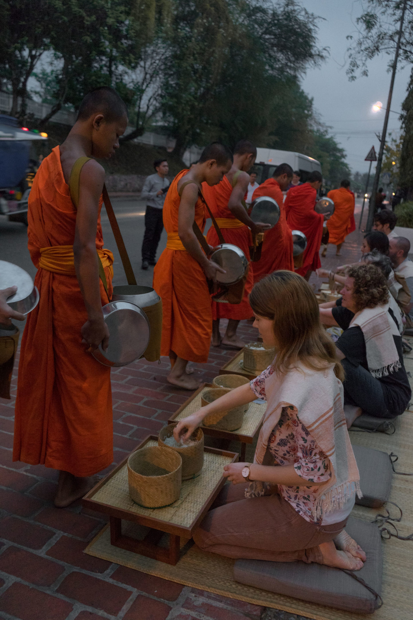 alms giving ceremony buddhist luang prabang