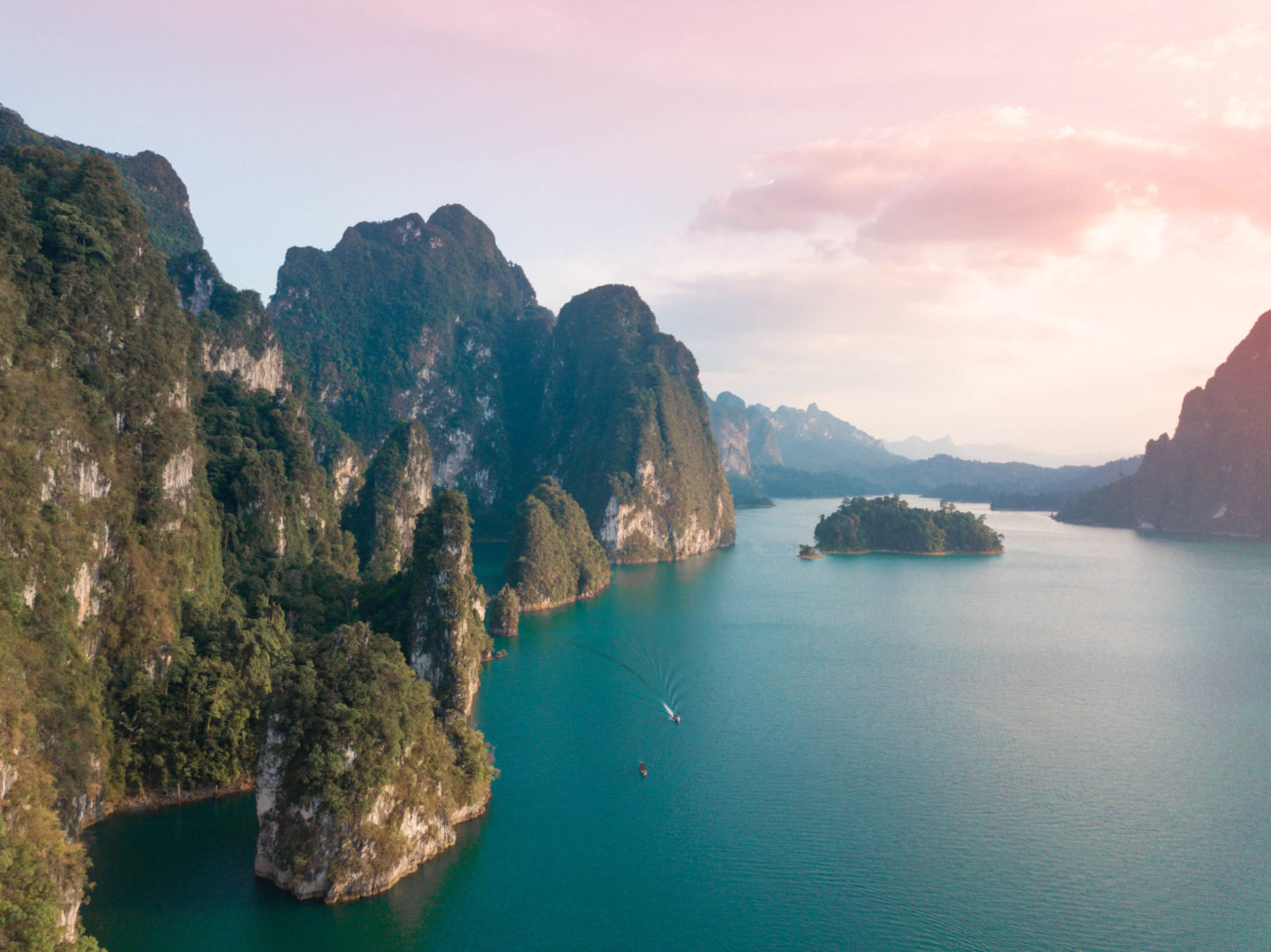 sunset over cheow lan lake in khao sok